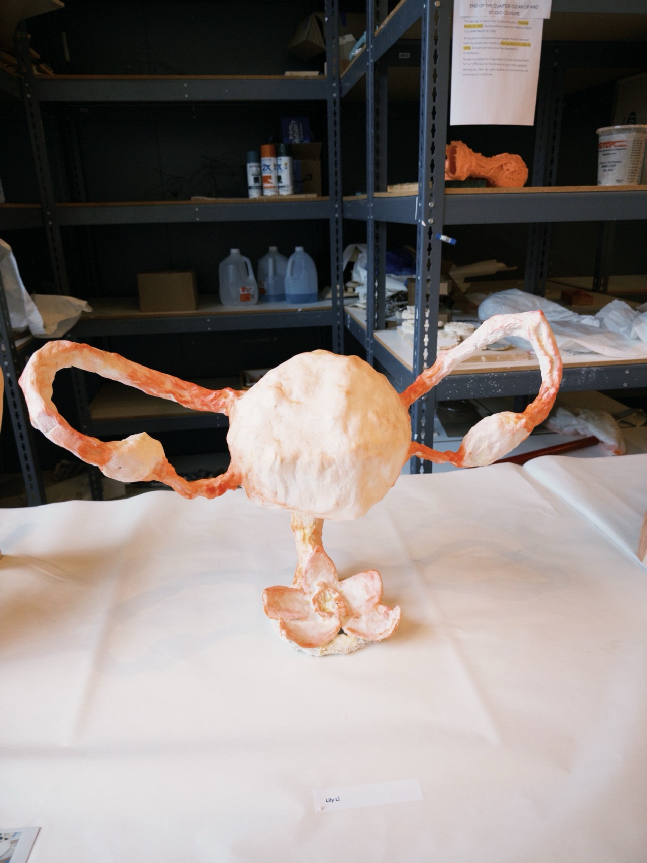 Plaster sculpture on a stand