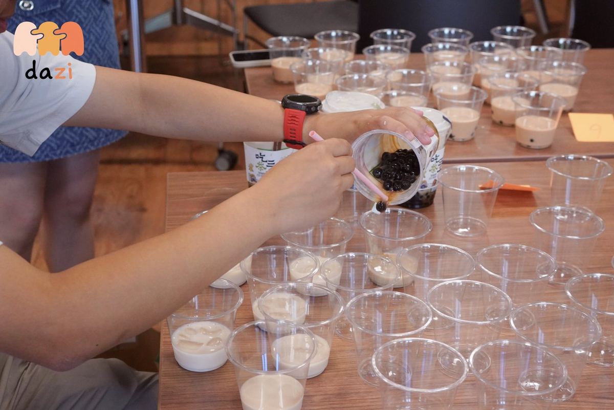Pouring boba at a tasting